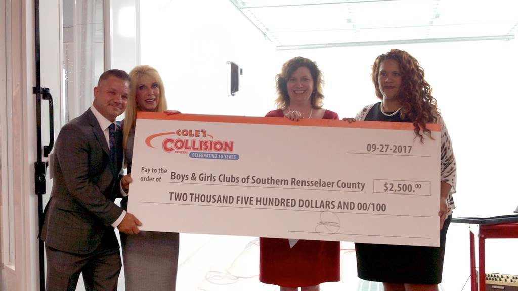 auto-body-shop-north-greenbush-gives-donation-v2 john cole coles cares image